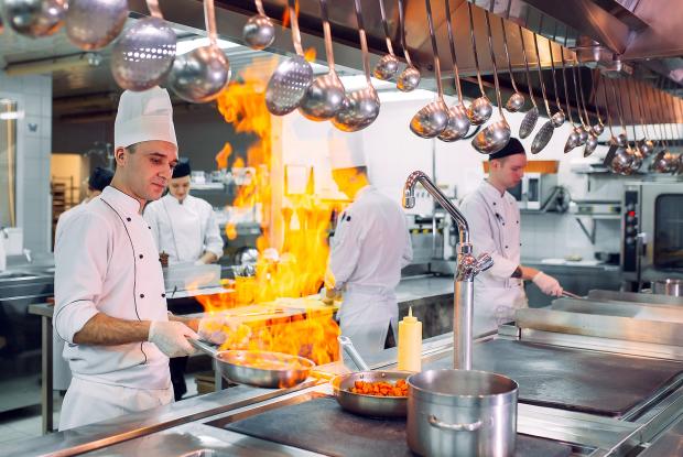 bigstock-Modern-Kitchen-Cooks-fire-316112008-davit85